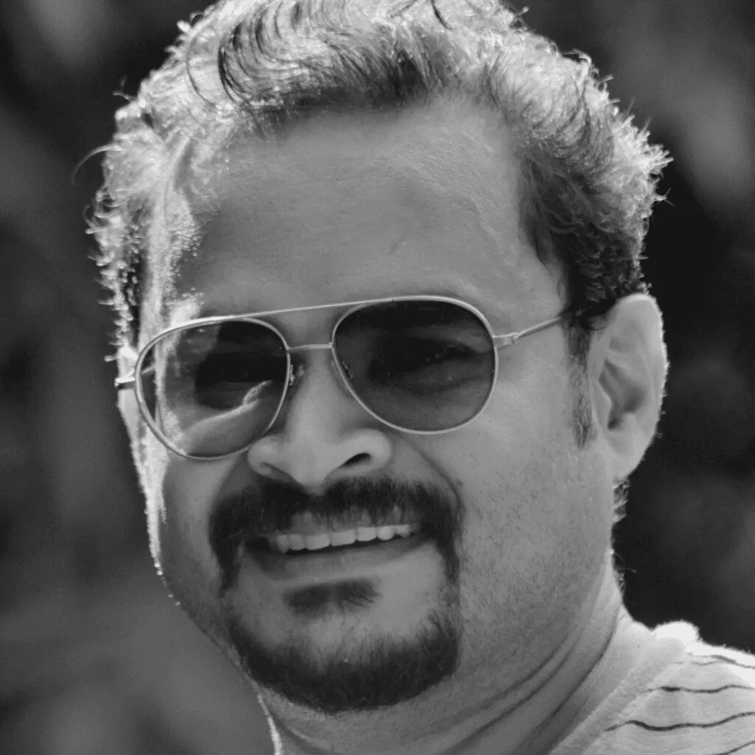 Sanooj Naringaparambil with family in a natural setting